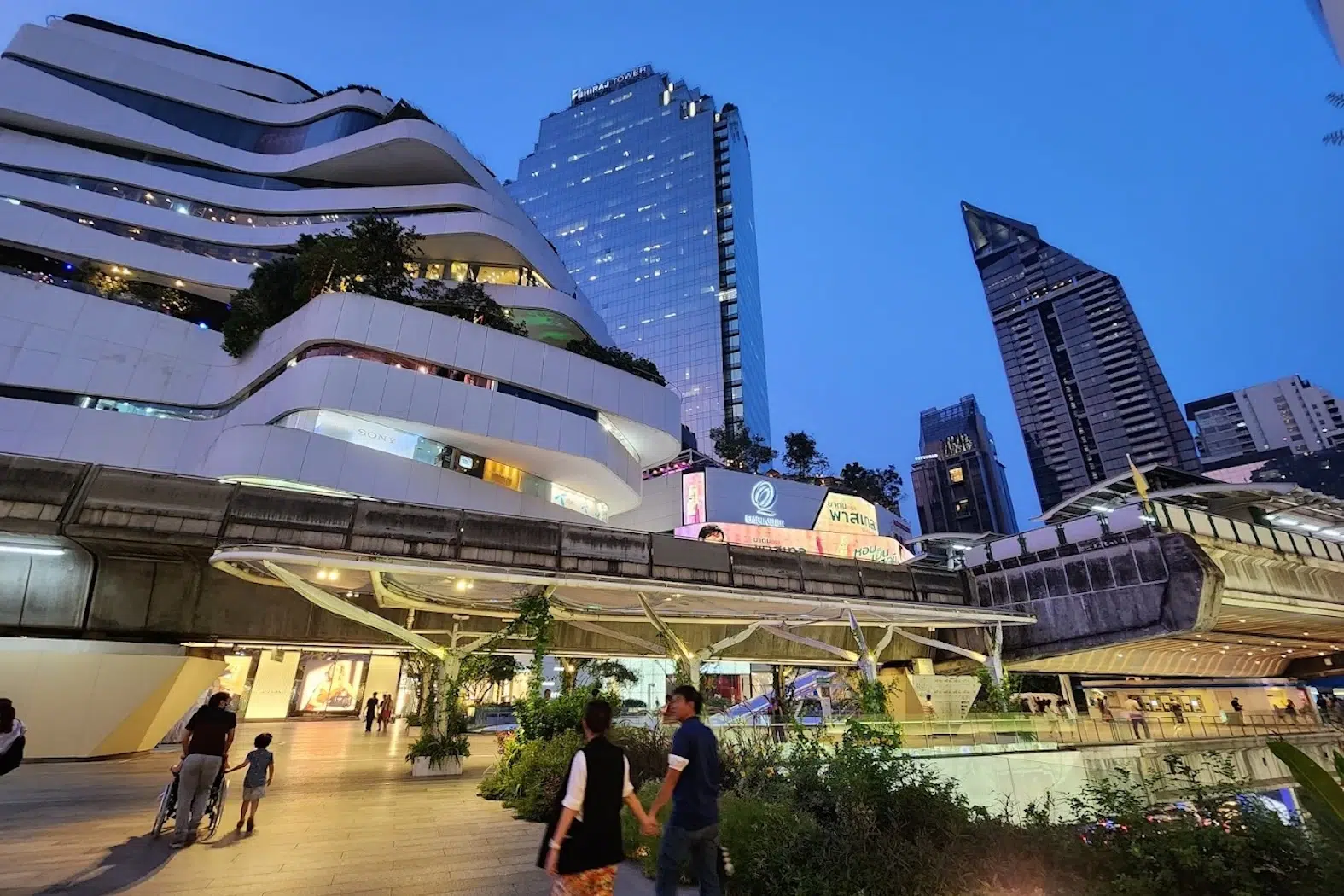 exterior emquartier mall by night