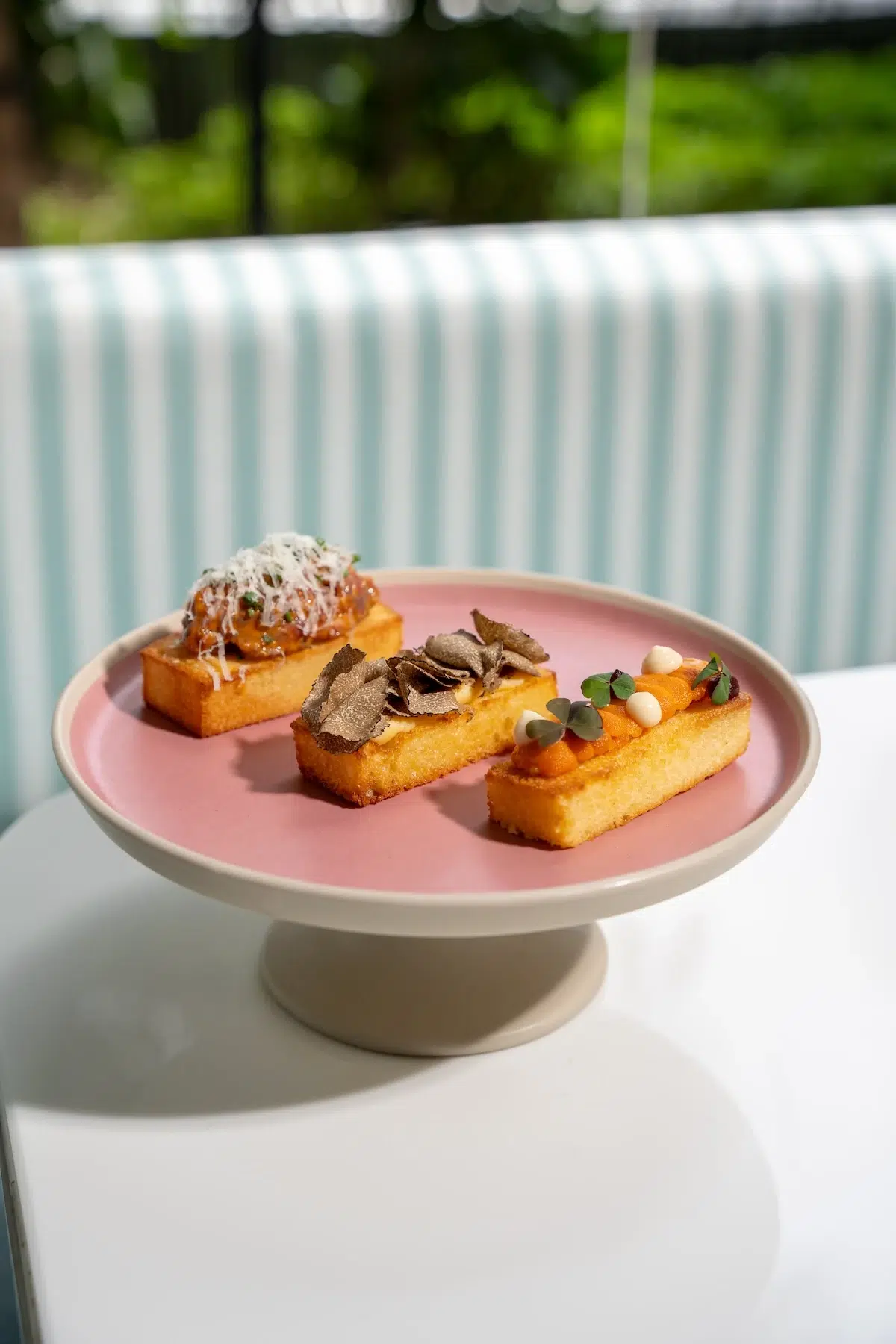 This is the Toast Bites (Truffle, Wagyu, Uni) from Mami Rose Restaurant located in EmSphere mall in Bangkok