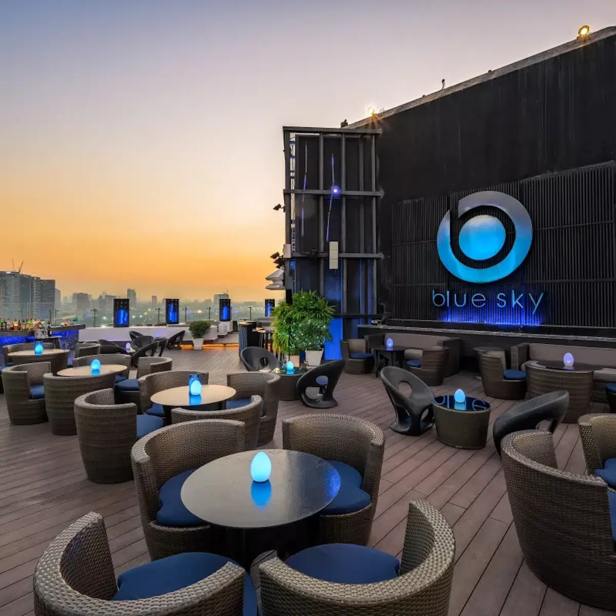 This is the exterior of the romantic Blue Sky Bar restaurant with a beautiful sunset over Bangkok