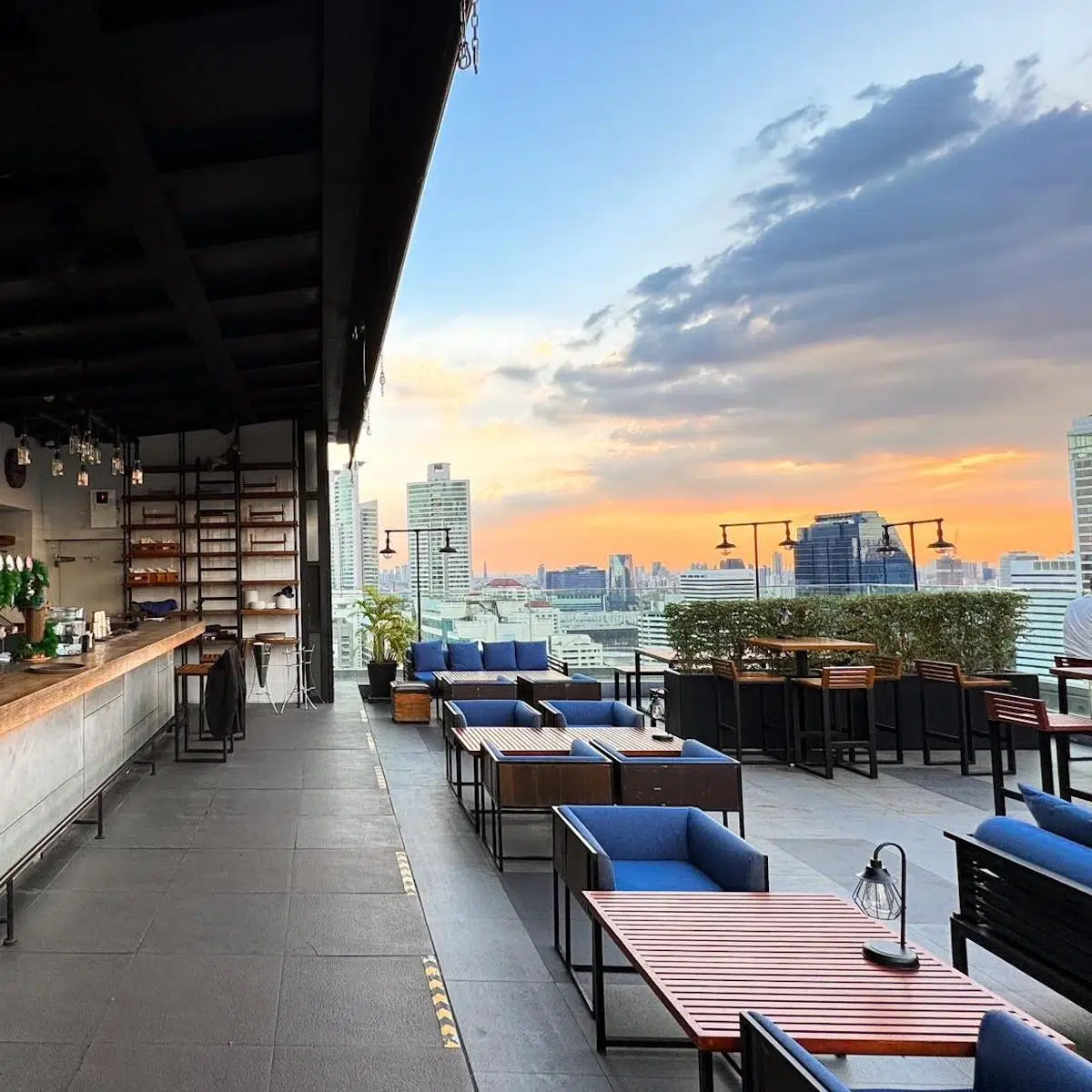 You can see the sunset view from the Brewski Rooftop Bar in Bangkok. 
